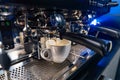 Close up view of barista making coffee. Professional coffeemaking machine. Royalty Free Stock Photo