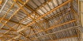 Close up view of a barn interior roof framework