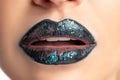 Close up view of beautiful woman lips with dark lipstick Royalty Free Stock Photo