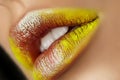 Close up view of beautiful woman lips with fashion makeup