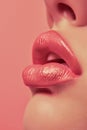 Close up view of beautiful woman lips with red lipstick on pink background. Open mouth with white teeth. Cosmetology Royalty Free Stock Photo
