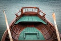 Close up view on beautiful wooden flat rowing boat with oars on lake bled, slovenia, go green concept