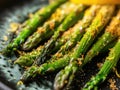 A close-up view of a beautifully arranged dish of fresh asparagus on a white plate