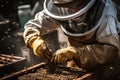 A close-up view of a beekeeper carefully tending to a buzzing beehive, wearing protective gear, and using a smoker to calm the