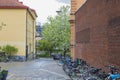 Close up view of bicycle parking on small street in downtown, Uppsala, Sweden. Healthy lifestyle concept. Sweden.