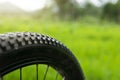 Close up view of bicycle tire on nature background Royalty Free Stock Photo