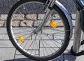 Close up view at a bicycle wheel with metal spokes Royalty Free Stock Photo