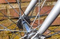 Close up view at a bicycle wheel with metal spokes Royalty Free Stock Photo