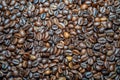 Close-up view of black coffee beans after roasting. Royalty Free Stock Photo