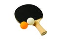 Close up view of black racket for table tennis with orange and white balls isolated. Ping pong game concept. Royalty Free Stock Photo