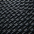 Close-up view of a black woven plastic mesh. The interlaced pattern forms a grid with Royalty Free Stock Photo