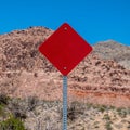 Close up view of blank red road sign post Royalty Free Stock Photo