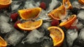 Close up view of Blood Oranges and berries on crushed ice on a black slate background. Healthy food concept