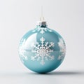 Close up view of blue Christmas ball with white snowflakes paintings. Decoration shiny bauble isolated white background. Design of Royalty Free Stock Photo