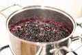 Close-up view of boiling blueberries. Cooking blueberry jam. Royalty Free Stock Photo