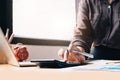 Close up view of bookkeeper or financial inspector hands making report, calculating or checking balance. Home finances, investment Royalty Free Stock Photo