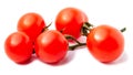 Close-up view branch of Fresh red cherry tomatoes with green leaves isolated on white Royalty Free Stock Photo