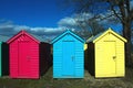 Close up view, brightly painted beach huts at the small village of Abersoch, Wales Royalty Free Stock Photo