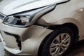 Close up view of broken bumper and damage to the auto after road accident. Car damage insurance, repair of bumpers and paintwork