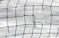 Close-up view of a broken volleyball net Royalty Free Stock Photo