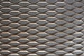 Close up view of bronze colored metal mesh background