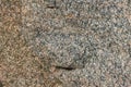 Close up view of brown-gray rock mountain texture. Royalty Free Stock Photo