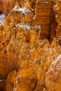 Close up view of bryce canyon national park hoodoos in winter in souther utah usa showing oranges and whites during the day