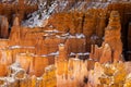 Close up view of bryce canyon national park hoodoos in winter in souther utah usa showing oranges and whites during the day