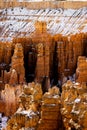 Close up view of bryce canyon national park hoodoos in winter in souther utah usa showing oranges and whites during the day