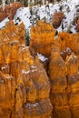 Close up view of bryce canyon national park hoodoos in winter in souther utah usa showing oranges and whites during the day