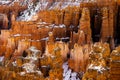 Close up view of bryce canyon national park hoodoos in winter in souther utah usa showing oranges and whites during the day