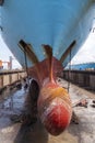 Close up view on the bulbous bow of the big container ship.