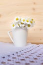Bunch of blooming daisies on rustic wooden background Royalty Free Stock Photo