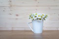 Bunch of blooming daisies on rustic wooden background Royalty Free Stock Photo