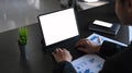 Close up view of businessman working at office with tablet computer and documents on office desk. Royalty Free Stock Photo