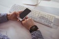 Close up view of businesswoman using her phone Royalty Free Stock Photo