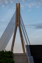 Close-up view of the cable-stayed bridge in Riga, highlighting the sweeping curve of its cable structure that rises gracefully int Royalty Free Stock Photo