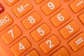 The close-up view of the calculator underscores its relevance to the fields of business and the economy