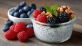 Close-up view captures chia pudding layered with assorted berries and nuts, showcasing vibrant colors and textures in a rustic Royalty Free Stock Photo