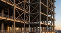 Steel skeleton of modern high-rise structure at sunset Royalty Free Stock Photo