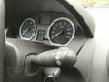 Close-up view in car dashboard with instruments of measurement in car cockpit with instrument panel for speeding and speedometer