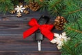 Close-up view of car keys with red bow as present on wooden background Royalty Free Stock Photo
