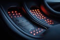Luxury Car Interior Detail: Illuminated Footrests with Carbon Fiber Texture Royalty Free Stock Photo