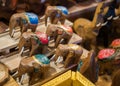 Carved wooden elephants selling in the souvenirs stall at Ratchada Rot Fai Train Night Market Bangkok Royalty Free Stock Photo