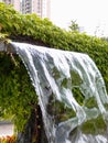 Close-up view of a cascading feature water fountain in a public park. Royalty Free Stock Photo