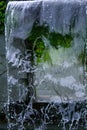 Close-up view of a cascading feature water fountain in a public park. Royalty Free Stock Photo