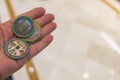 Close up view of casino chips on man\'s hand.