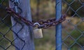 Chain and padlock locking metal gate