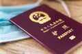 Close up view of chinese passport and facial mask Royalty Free Stock Photo