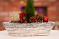 A close-up view of a Christmas Day reed against the backdrop of a fuzzy fireplace Royalty Free Stock Photo